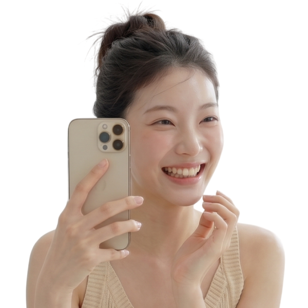 Smiling woman taking a selfie with her phone